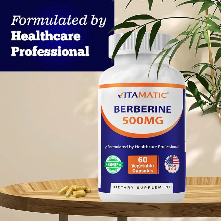 Vitamatic Berberine 500MG supplement bottle on a wooden surface with a plant in the background.