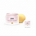 ISDIN skincare product with pink jar and yellow ball on a white background