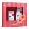 Uriage skincare product set in a decorative box with flowers on a white background