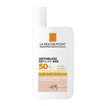 Bottle of La Roche Posay Anthelios UVMUNE 400 Tinted Sunscreen with SPF 50+ protection, indicating broad-spectrum protection against UVA & UVB rays.