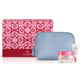 Collistar beauty products including a pink box, blue pouch, and skincare items on a white background