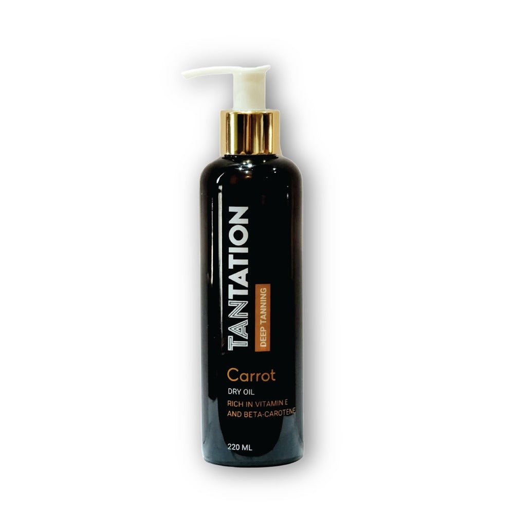 A bottle of carrot tanning oil placed on a sandy beach, with golden sunlight reflecting off the surface
