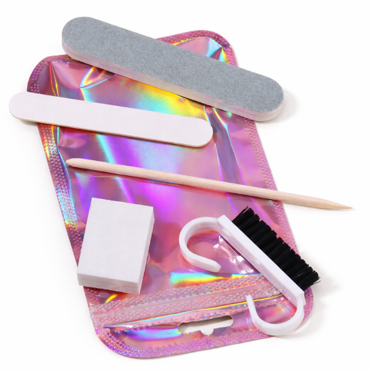Set of nail care tools including a file, brush, and nail clipper on a colorful case.