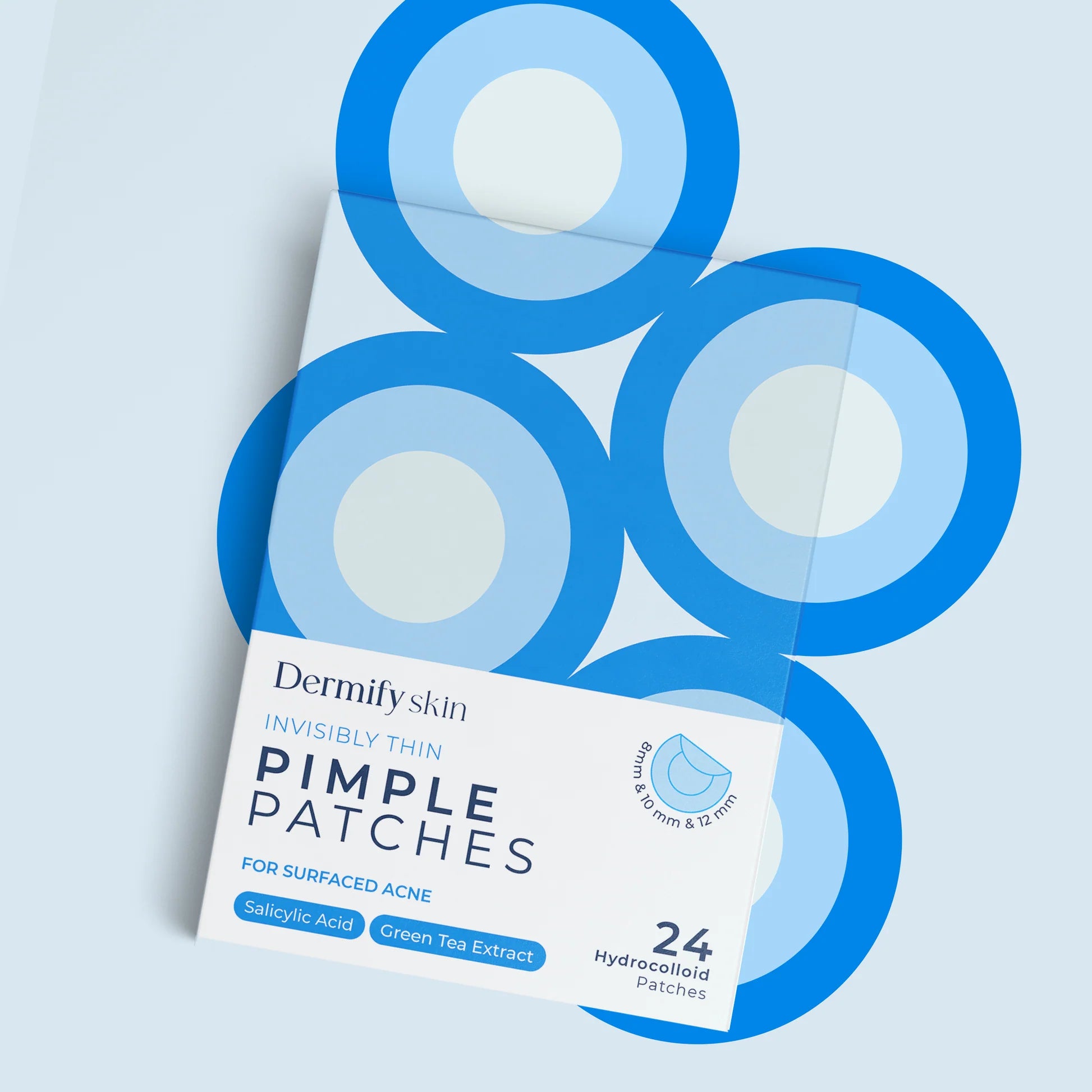 Pack of Dermify skin pimple patches with blue circles on a light gray background