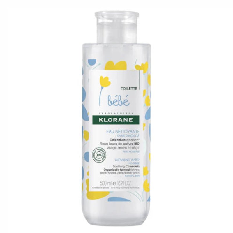 Klorane bottle with floral design on a white background