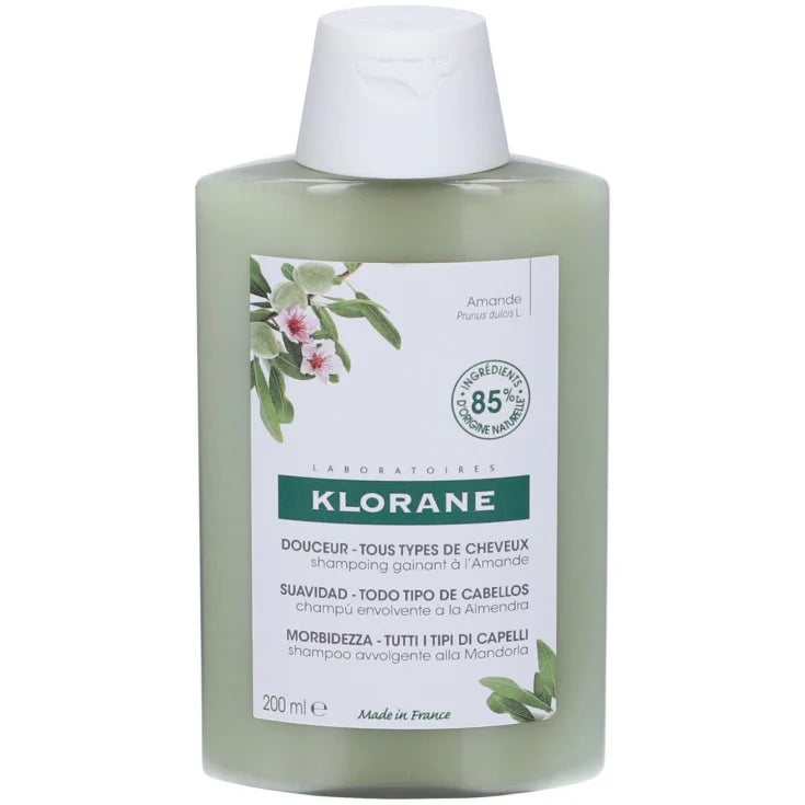 Klorane shampoo bottle with green label on a white background