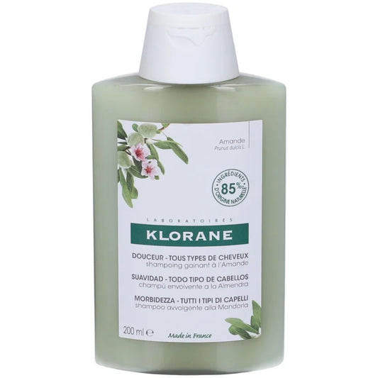 Klorane shampoo bottle with green label on a white background